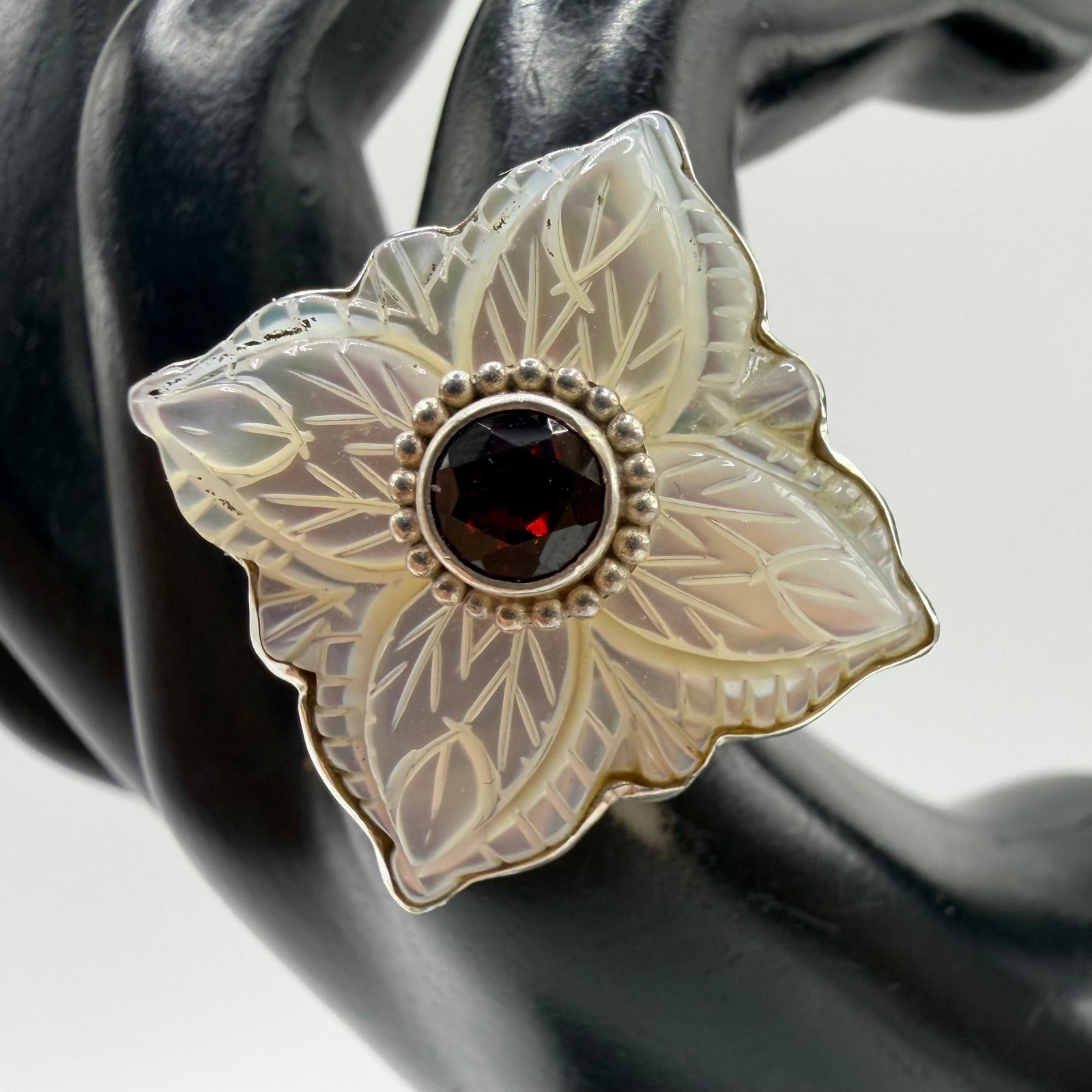 Sajen Sterling Silver Ring Carved Mother of Pearl Red Garnet: This item is in good pre-owned, previously used/displayed condition with noticeable light wear and surface scratches. Please reference all photos for full details. This piece of jewelry has been caref