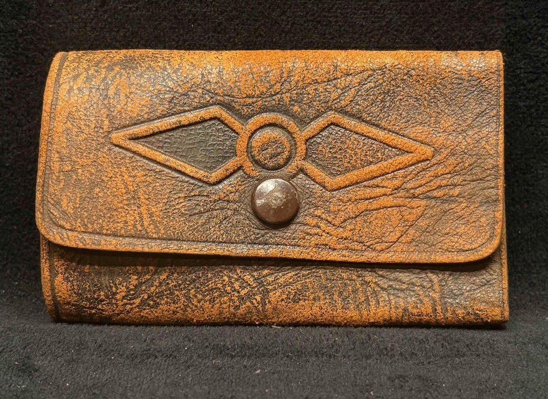 Vintage 1930s to 1950s Brown Rustic Leather Key Case: This vintage-style key care is designed to hold and organize keys. Popular during the 1930s to 1940s, this vintage leather case has a distinctive diamond-shaped debossed designs on the front. The