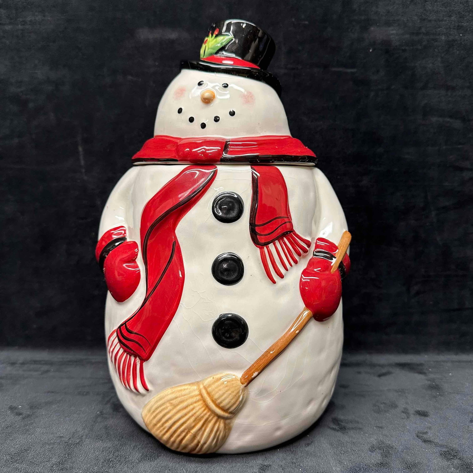 Mrs. Fields Snowman Holiday Christmas Cookie Jar Treat Container: No major chips, cracks, or breaks. Sticky tape residue on the back of the jar and slight markings. Light crazing is noticed throughout the porcelain piece. This item is in good pre-owned, previously d