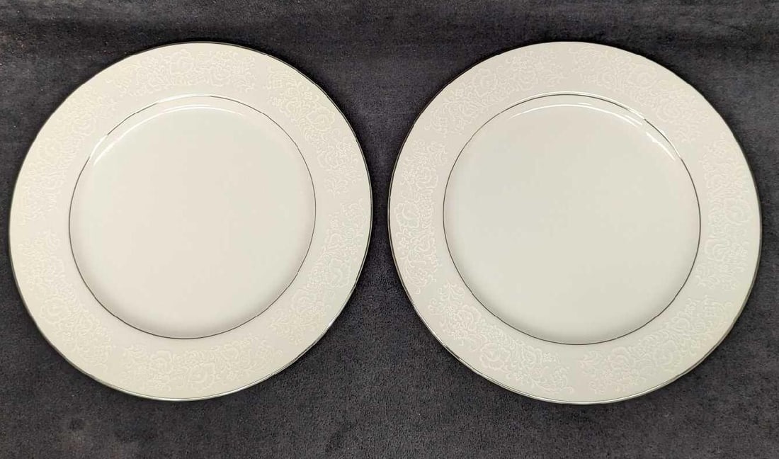 2 Retired International Fine China Juliet Dinner Plates F: 2 Retired International Fine China Juliet Dinner Plates F. Each plate is approx 7 5/8" x 7 5/8" x 3/4" and the total weight is 2.49 lbs. The plates do not have any chips or cracks, and there are some 