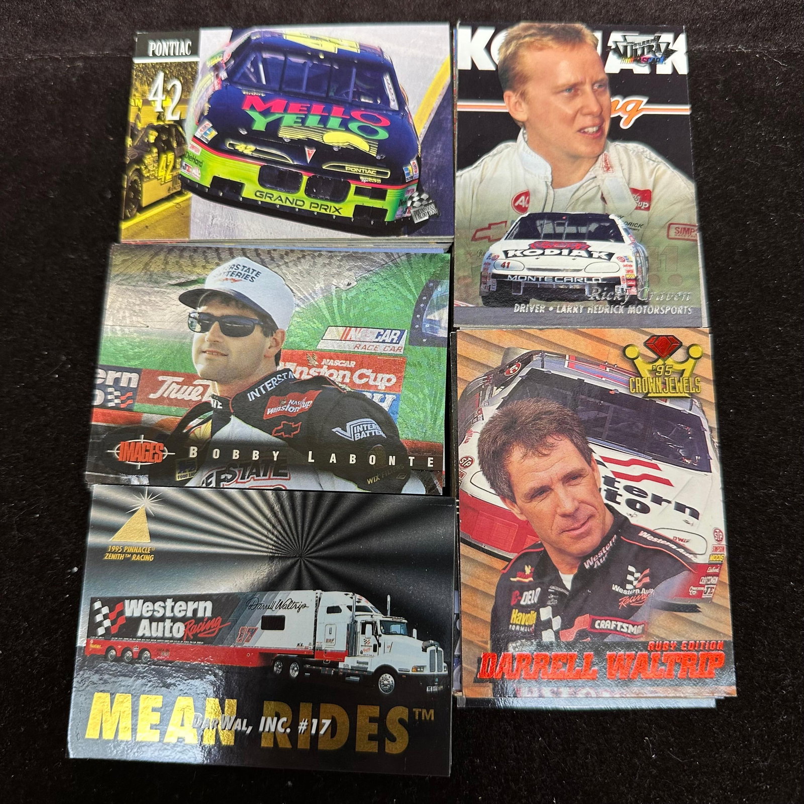 100 NASCAR Racing Trading Cards Lot Pinnacle Finish Line Upper Deck Era: A lot of 100 NASCAR racing trading cards from the mid-1990s era. Includes cards from sets such as Pinnacle, Finish Line Racing, Upper Deck, and similar releases. Drivers and teams represented include 
