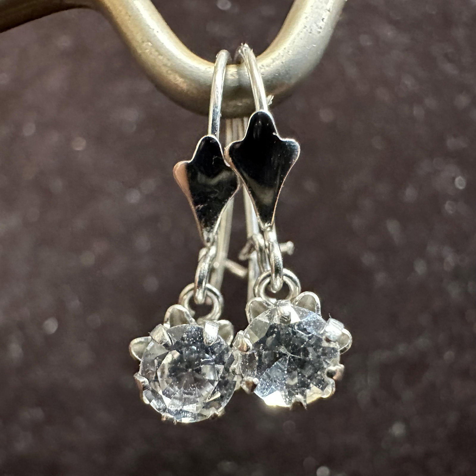 CZ Cubic Zirconia 14K White Gold Dangle Drop Earrings: This item is in good pre-owned, previously used/displayed condition with noticeable light wear and surface scratches. Please reference all photos for full details. This piece of jewelry has been teste
