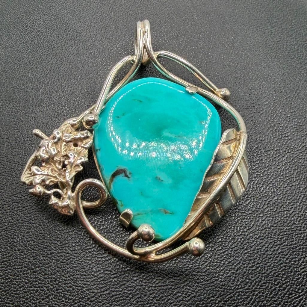 Sterling Silver Faux Turquoise Pendant: This piece of jewelry has been tested and researched prior to listing. Please view all our pictures they are part of our description. DETAILS: Metal - Sterling Silver Color - Silver Stones - none Hall
