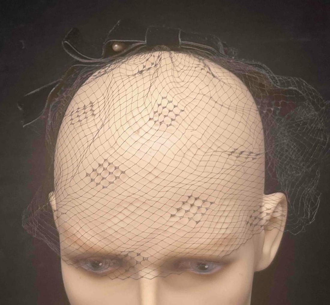 Vintage Lace Headpiece Mr.John Caprice New York And Black Bow Veil Headpiece: This lot contains a Vintage Lace Headpiece Mr.John Caprice New York And Black Bow Veil Headpiece. The Navy Blue Mr. John Caprice headpiece is approx. 6 1/2" x 4 " x 1". The black bow headpiece can be 