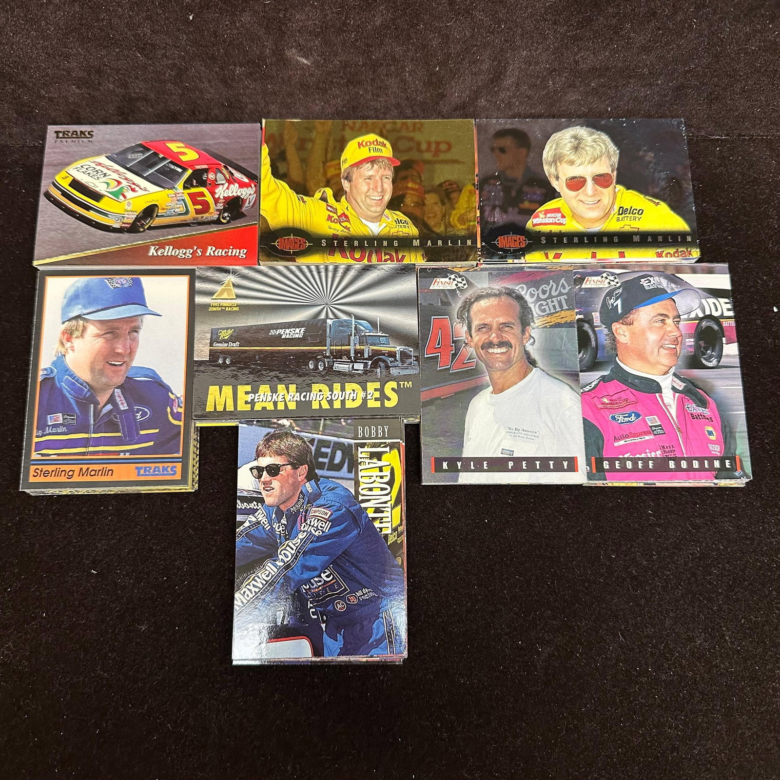 NASCAR Race Trading Cards Collection Sterling Marlin Kellogg's X46: Cards are loose and not stored in sleeves or protective holders. The condition shows typical handling and storage wear consistent with loose trading cards. The lot includes duplicates. Approximately