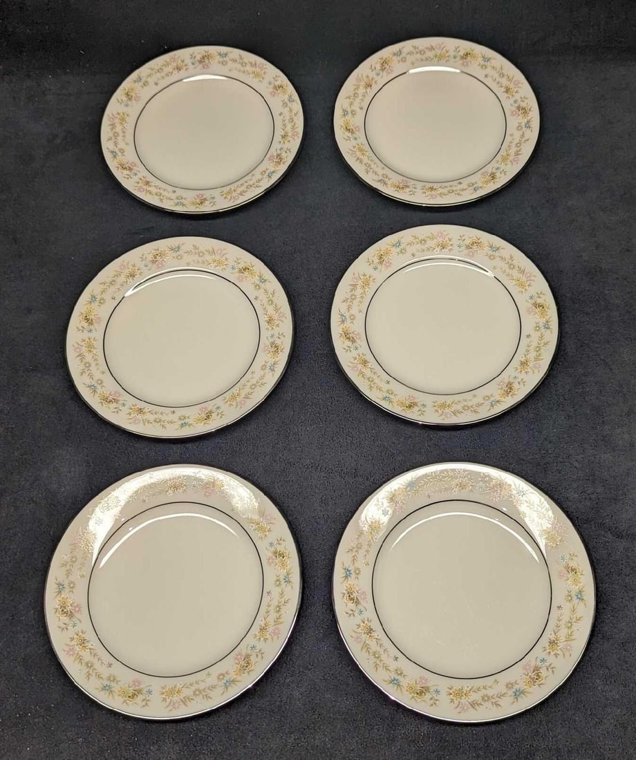6 Noritake Blossom Time Bread & Butter Plates A: 6 Noritake Blossom Time Bread & Butter Plates A. Each bowl is approx 6 3/8" x 6 3/8" x 5/8" and the total weight is 2.28 lbs. The bowls have no chips or cracks. The "Blossom Time" design was released