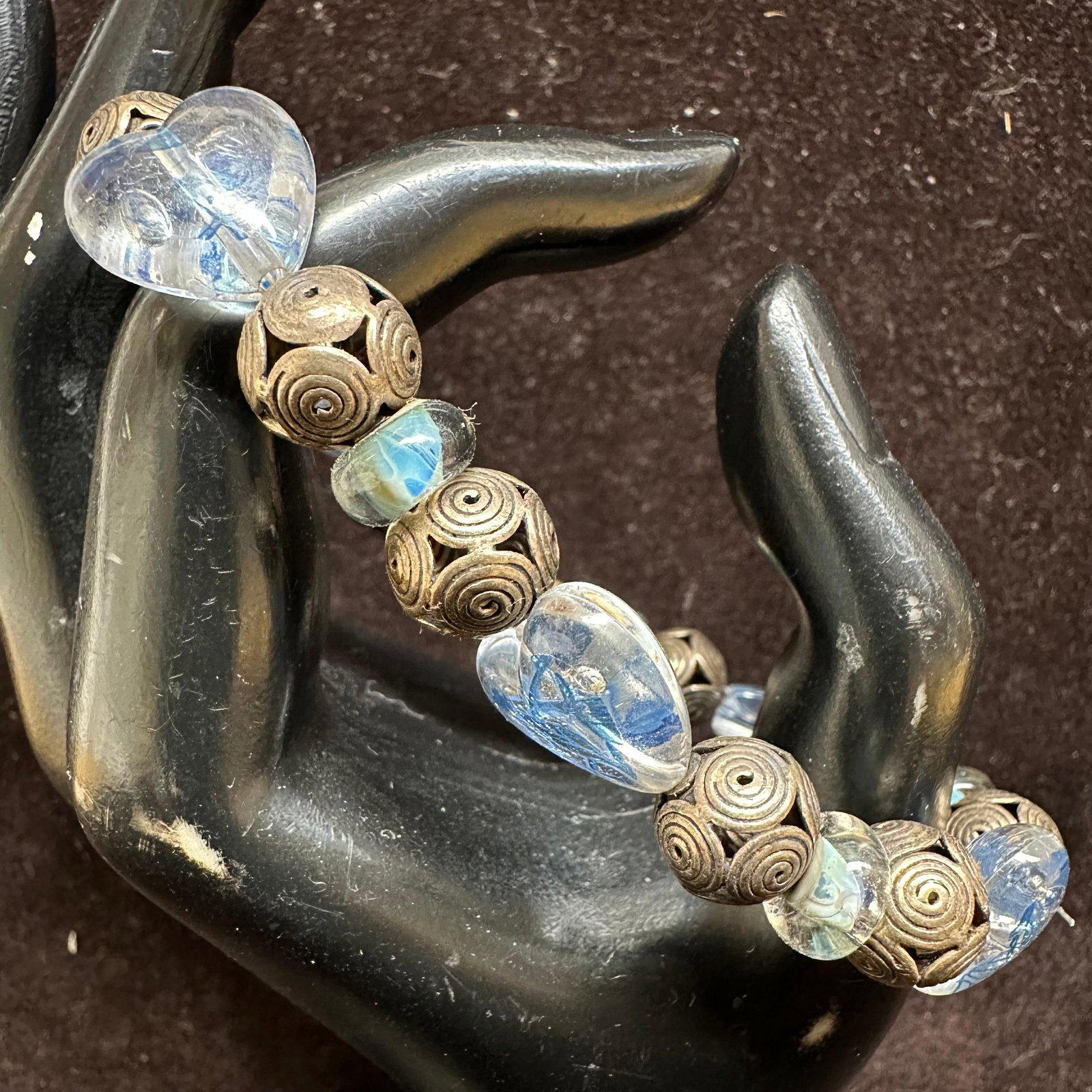Blue Glass Heart and Round Shaped Beads with Sterling Silver Bead and Clasp Accents L14: This item is in good pre-owned, previously used/displayed condition with noticeable light wear and surface scratches. Please reference all photos for full details. This piece of jewelry has been teste