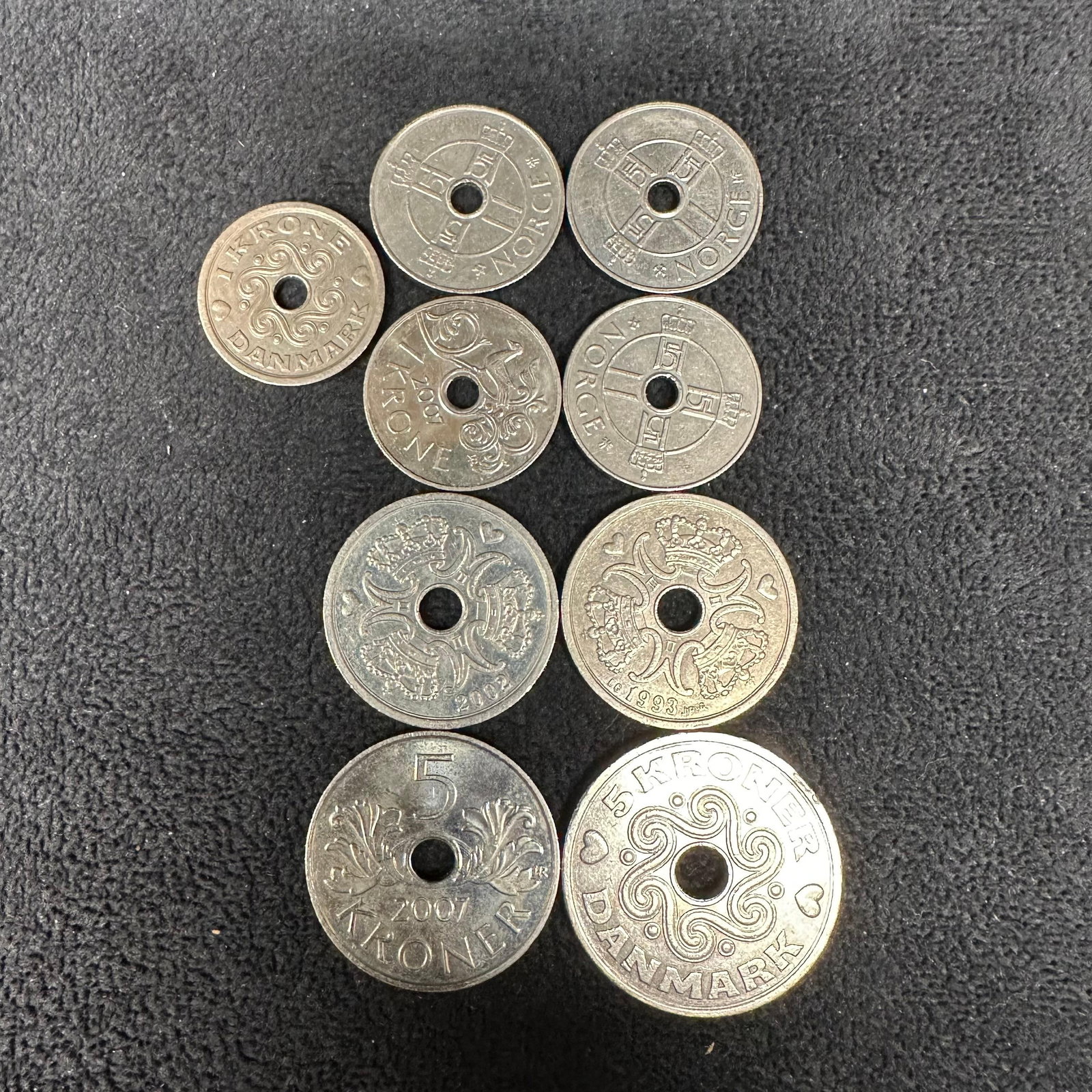 Denmark Currency Coin Lot Danish Kroner Danmark Krone Nine Coins: Several Danish currency coins from the 1990s to the 2000s. These items are in good pre-owned condition with noticeable light wear, markings, and surface scratches. Please reference all photos for