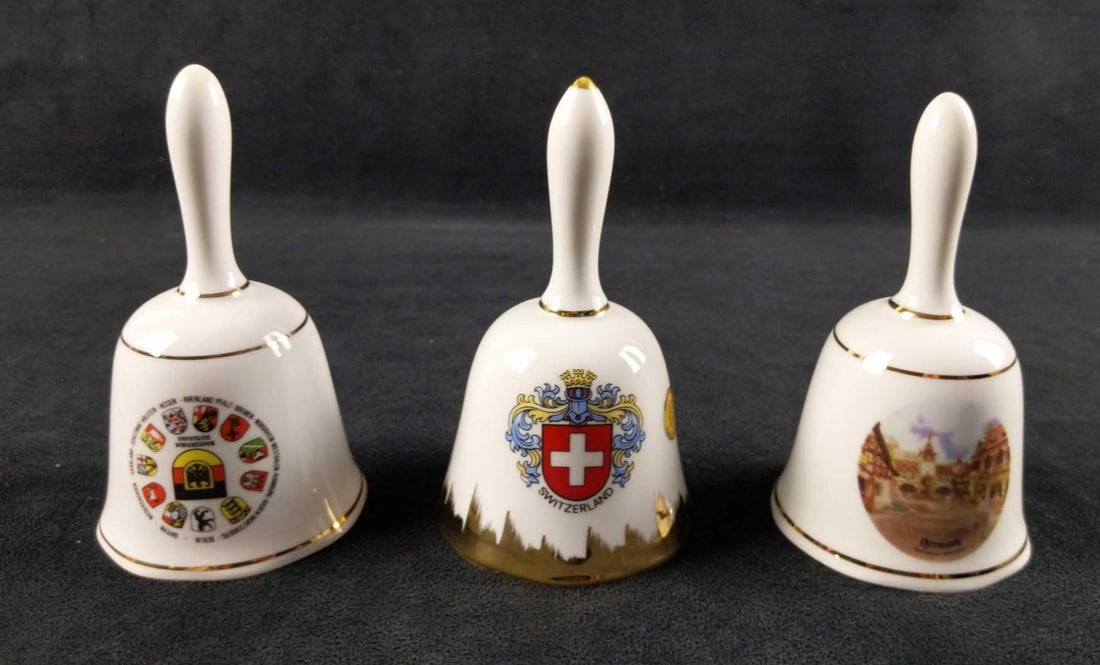 3 Disney Epcot German Switzerland Porcelain Bells: (1) Bundesrepublik Deutschland (Federal Republic of Germany) Bell. Originally sold at Epcot at the Walt Disney World Resort in Orlando, Florida. Bell is approx 3" x 3" x 5. Bell is in goo