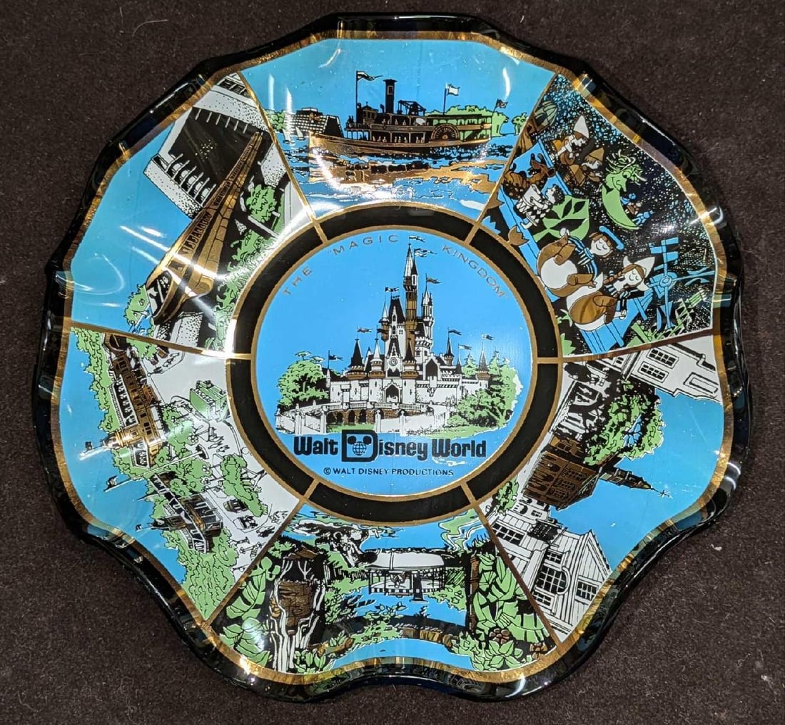 Vintage Disney World Blue Glass Candy Dish 1970s E: Vintage Disney World Blue Glass Candy Dish 1970s E. This is approx 7" x 7" x 1 1/2" and it weighs 0.47lb. The glass has no chips or cracks. There is some signs of wear. 