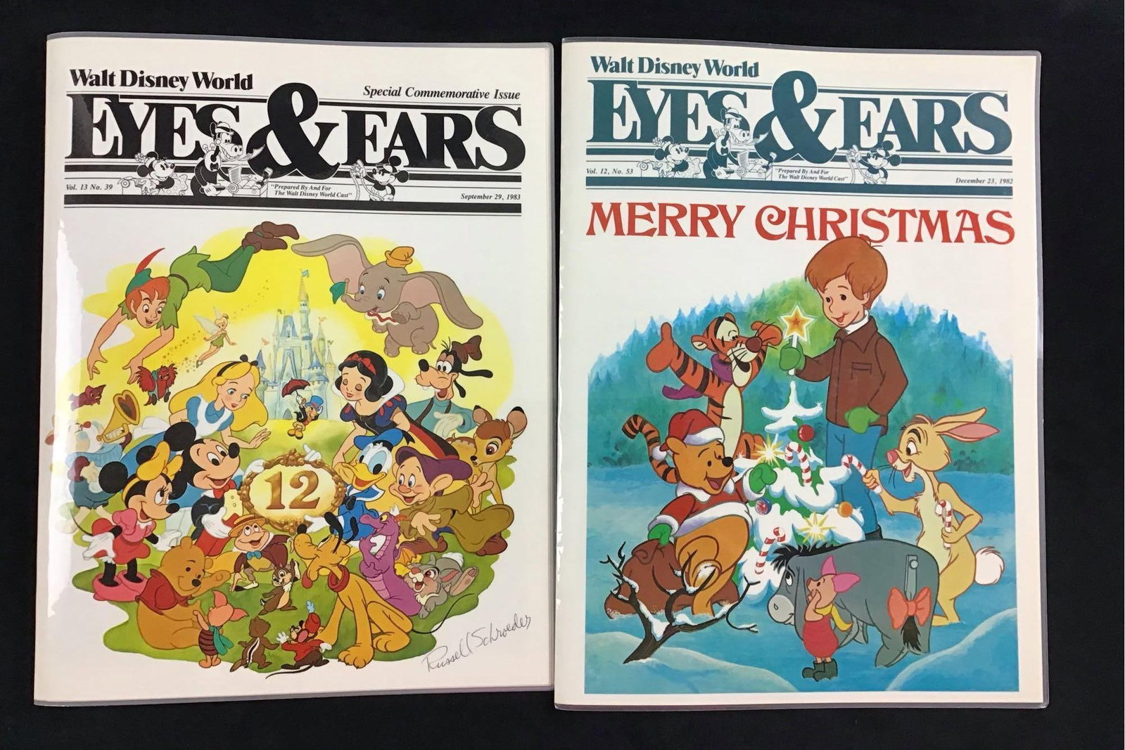 Lot of 2 Vintage Eyes and Ears Newspaper Signed by Russel Schroeder: These newspaper covers are amazing. They feature memorable Disney characters that we know and love. Inside they have articles of various Disney news from 1982. They are laminated and are in excellent 