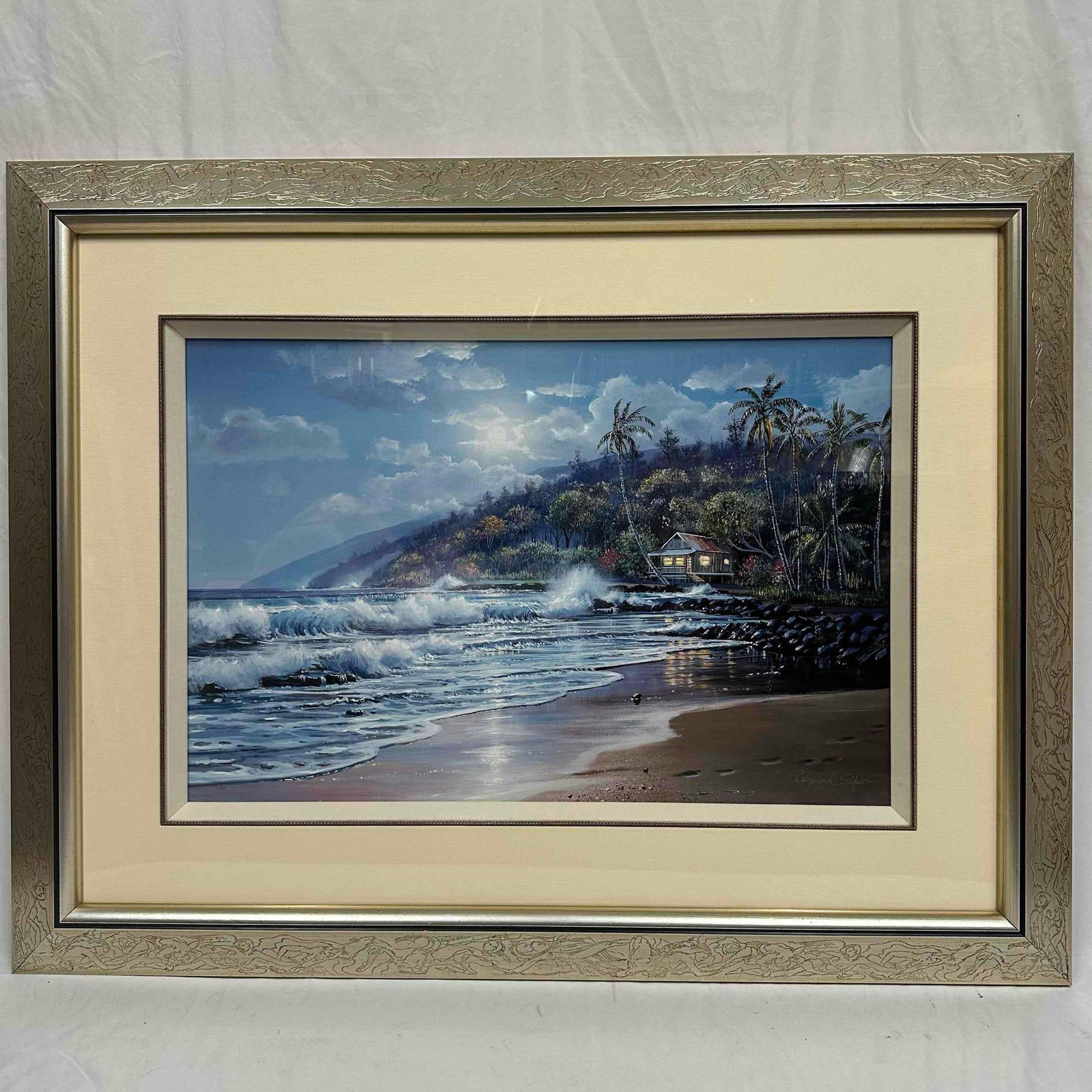 Footprints In Mahalapu Giclee on Paper Framed Raymond Sipos Hand Signed and Numbered Large R153: Footprints In Mahalapu Giclee on Paper Framed Raymond Sipos Hand Signed and Numbered. Also referred to as "Seaside Hideaway" this nighttime beach scene features a house nestled among the palm 