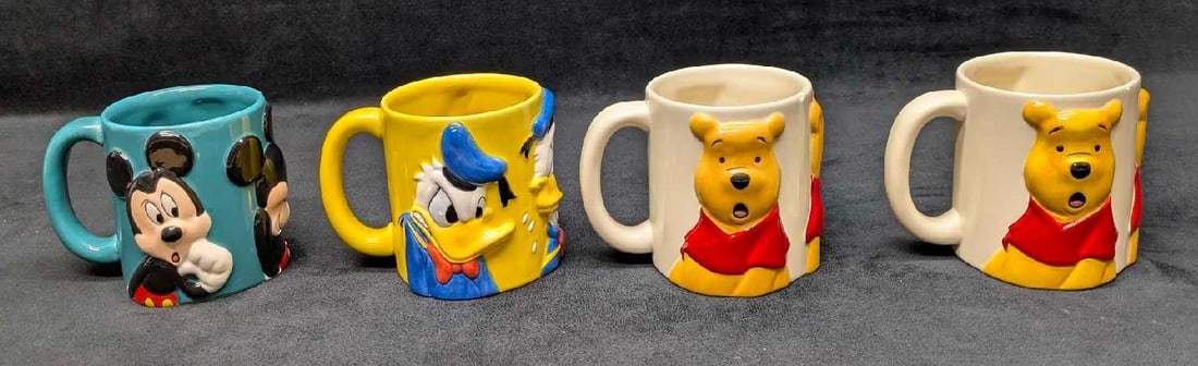 4 Disney 3D Mickey Mouse Donald Duck Winnie The Pooh Ceramic Mugs: 4 Disney 3D Mickey Mouse Donald Duck Winnie The Pooh Ceramic Mugs. This lot includes: (1) Donald Duck Mug. This is approx 4" x 4 3/4" x 4". (2) Winnie The Pooh Mugs. This is approx 4" 
