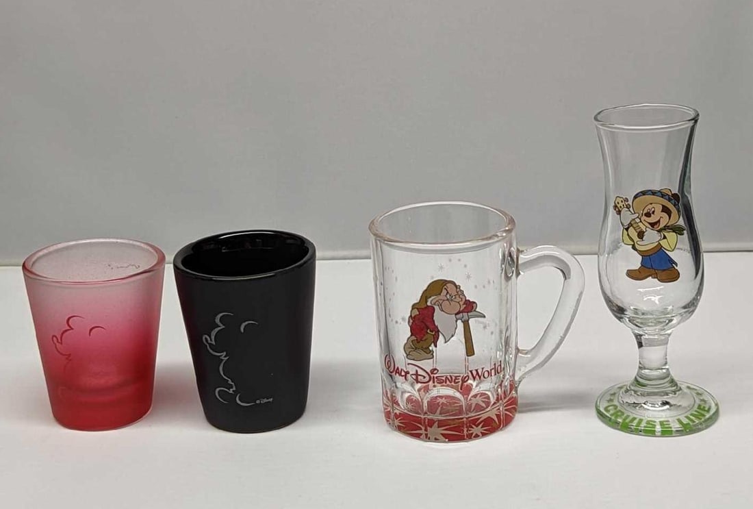 Disney Mickey Shot Glasses & Mini Glasses: Disney Mickey Shot Glasses & Mini Glasses. This lot includes: (1) Black Disney Mickey Mouse Shot Glass. This is approx 2" x 2" x 2 1/4" and it weighs 0.19lb. (1) Frosted Red Disney Mic