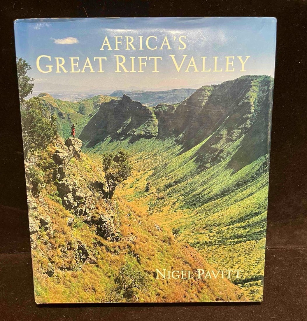 Africa's Great Rift Valley By Nigel Pavitt: This lot contains a hardcover copy of Africa's Great Rift Valley By Nigel Pavitt. The approx. weight and dimensions are listed below. Overall the book is in good pre owned condition with mino