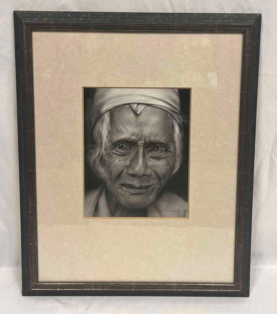 Framed & Signed Original Portrait Chalk On Black Paper: This lot contains a Framed & Signed Original Portrait Chalk On Black Paper. It is approx 22" x 18" and it weighs about 3.5lbs. Overall the artwork is in good used condition with no noticeable flaws. P