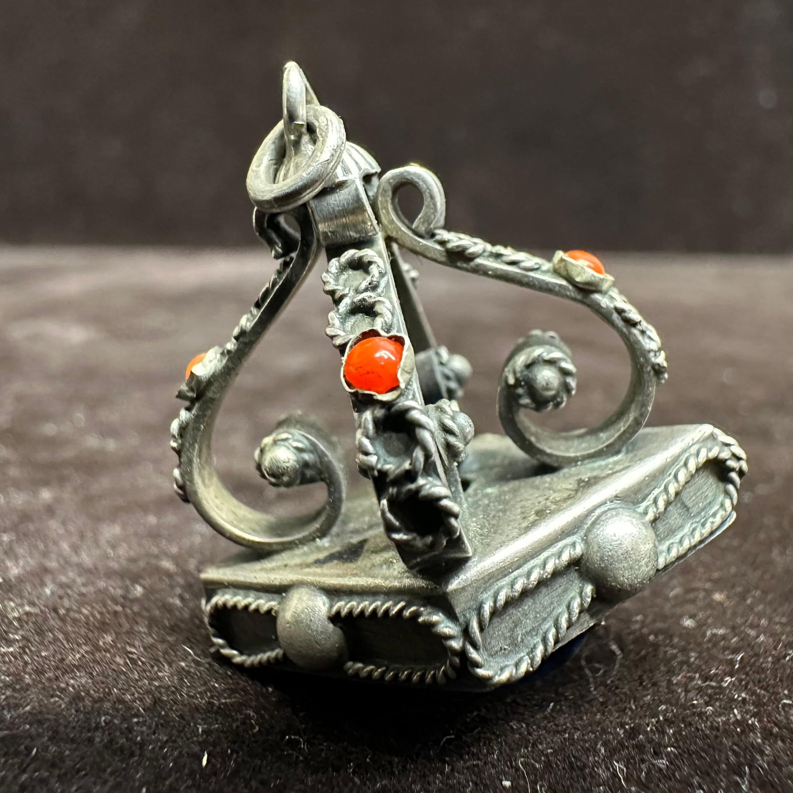 Victorian Etruscan Style Ribbon Design Blue and Red Stone Silver Charm T27: This item is in good pre-owned, previously used/displayed condition with noticeable light wear and surface scratches. Please reference all photos for full details. This piece of jewelry has been teste