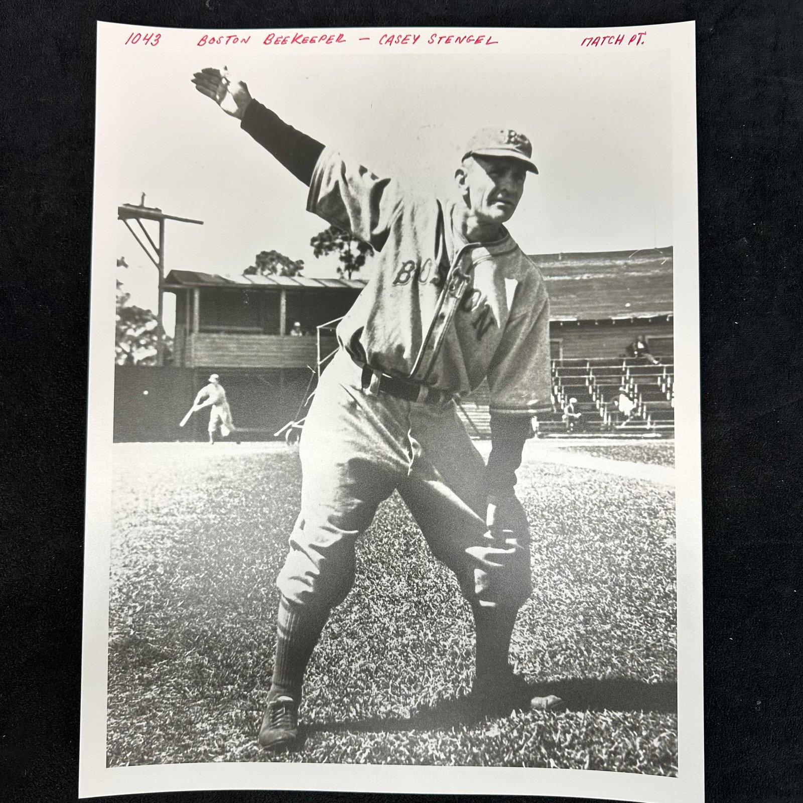 Boston Bees Outfielder Casey Stengel Silver Gelatin Print: Black and white photographic analog print depicting Casey Stengel in uniform with the Boston Bees (later Braves), captured during warm-ups. This early shot of Stengel highlights his playing career bef