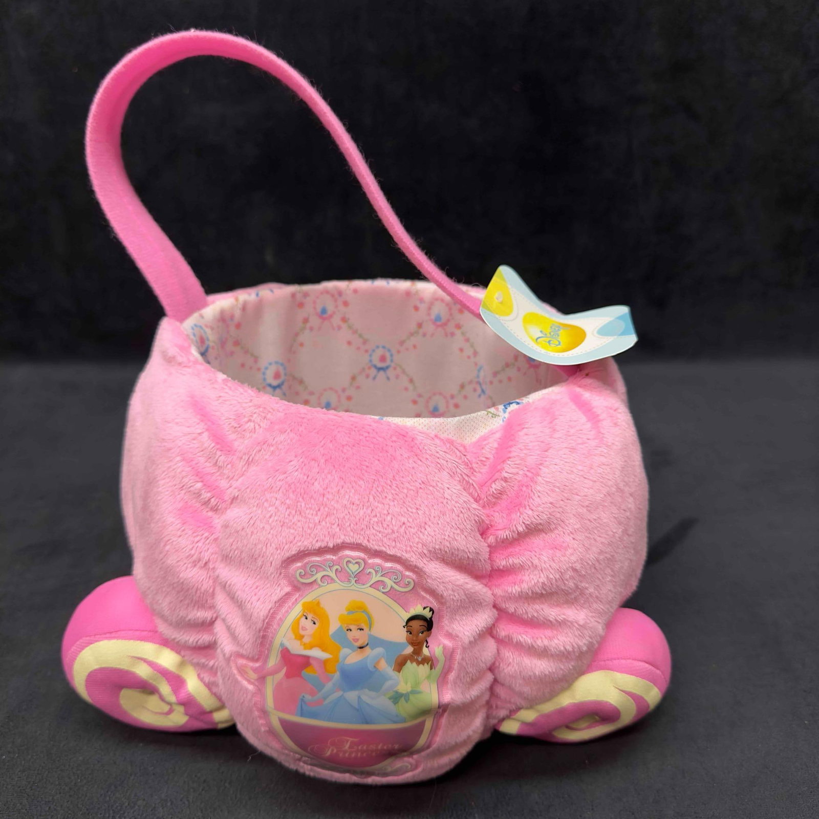 Disney Princess Plush Trick or Treat Bucket Easter Basket Belle Cinderella Pink: Disney Princess Plush Trick or Treat Bucket Easter Basket Belle Cinderella Pink. This plush Easter basket features Disney Princesses Tiana, Cinderella, and Aurora. Can be used for trick or treating. C