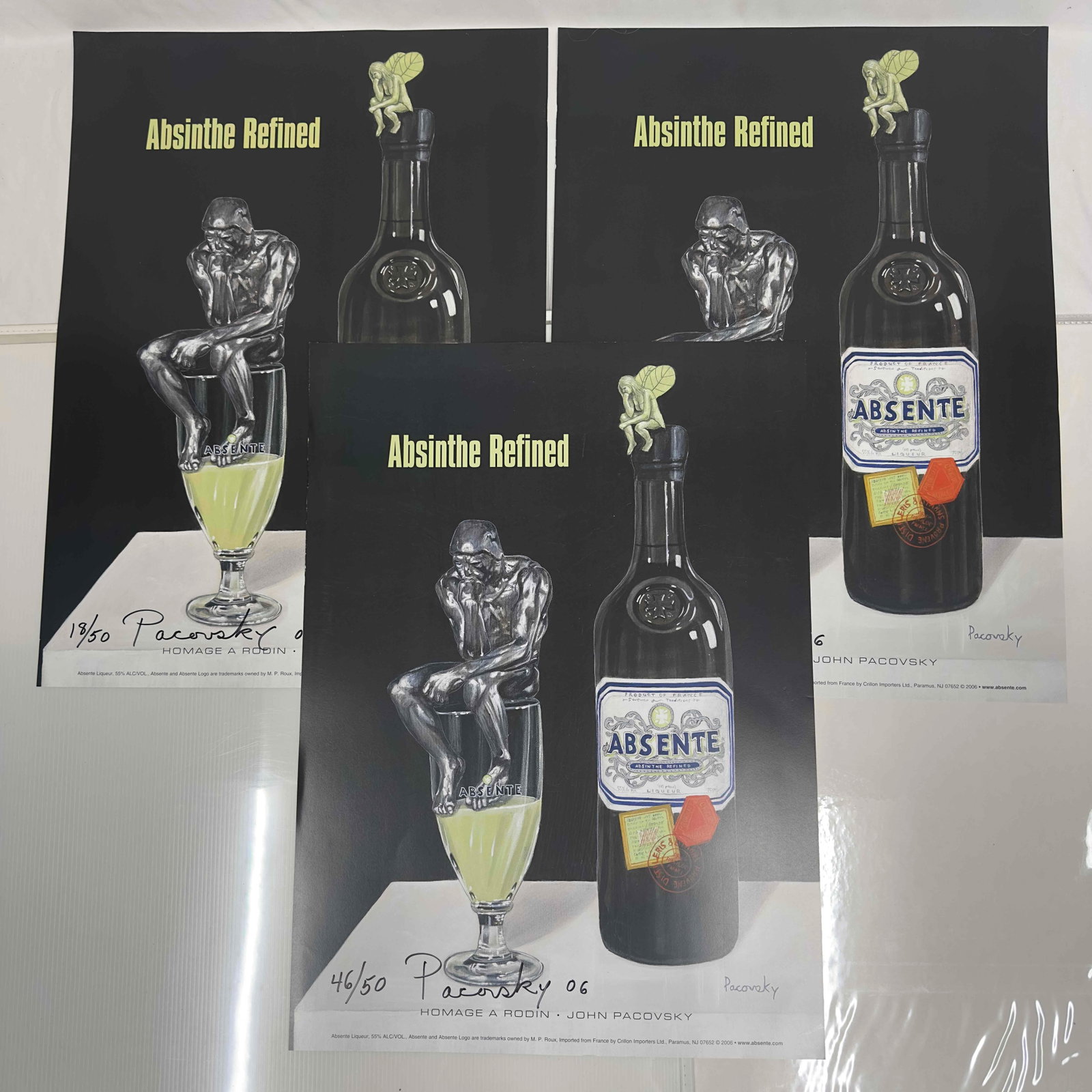 Absinthe Refined Ad Poster Homage A Rodin by John Pacovsky Hand Signed and Numbered: Absinthe Refined Ad Poster Homage A Rodin by John Pacovsky Hand Signed and Numbered. This set includes three (3) hand signed and numbered posters by John Pacovsky. Limited Edition 50, from 2006. A few
