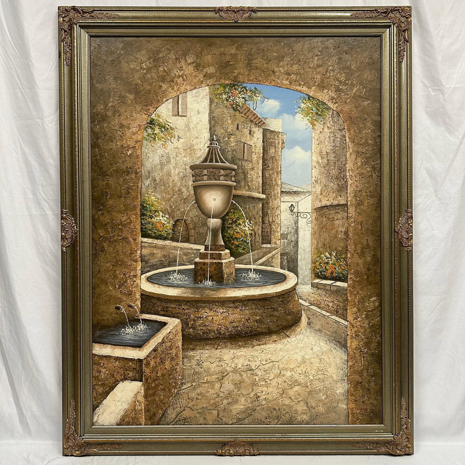 Signed Fountain Courtyard Oil Painting on Canvas Tuscan Village Scene Large Artwork: Large artwork, original oil painting on canvas signed, unknown artist, featuring a Tuscan-style courtyard with a tiered stone fountain surrounded by rustic buildings and flowering vines. Framed in an 