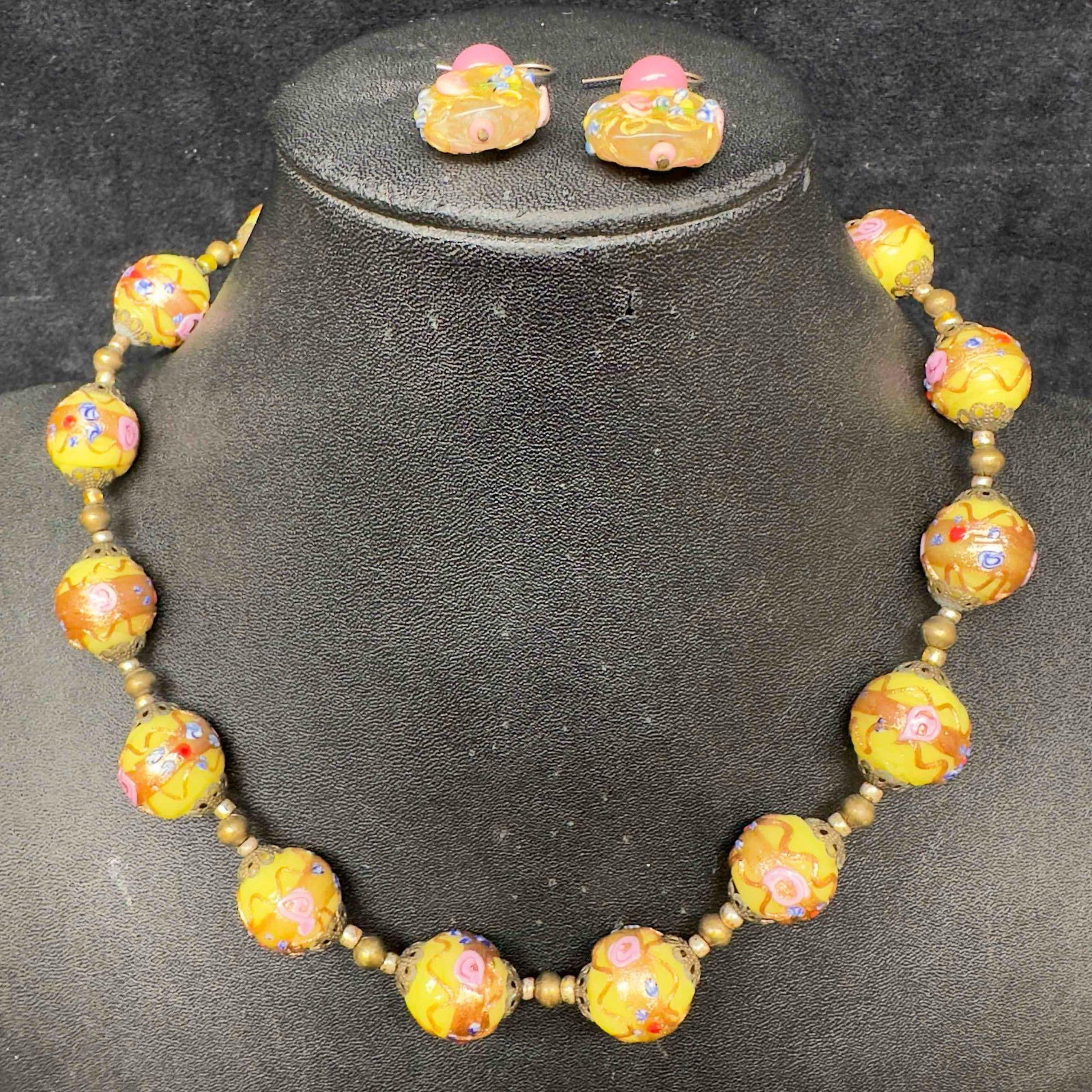 Murano Venetian Art Glass Lamp Work Yellow Floral Beaded Necklace and Earrings Set C51: Murano Venetian Art Glass Lamp Work Yellow Floral Beaded Necklace and Earrings Set C51. Necklace and earrings with yellow glass beads with beautiful designs on each. The necklace and earrings feature