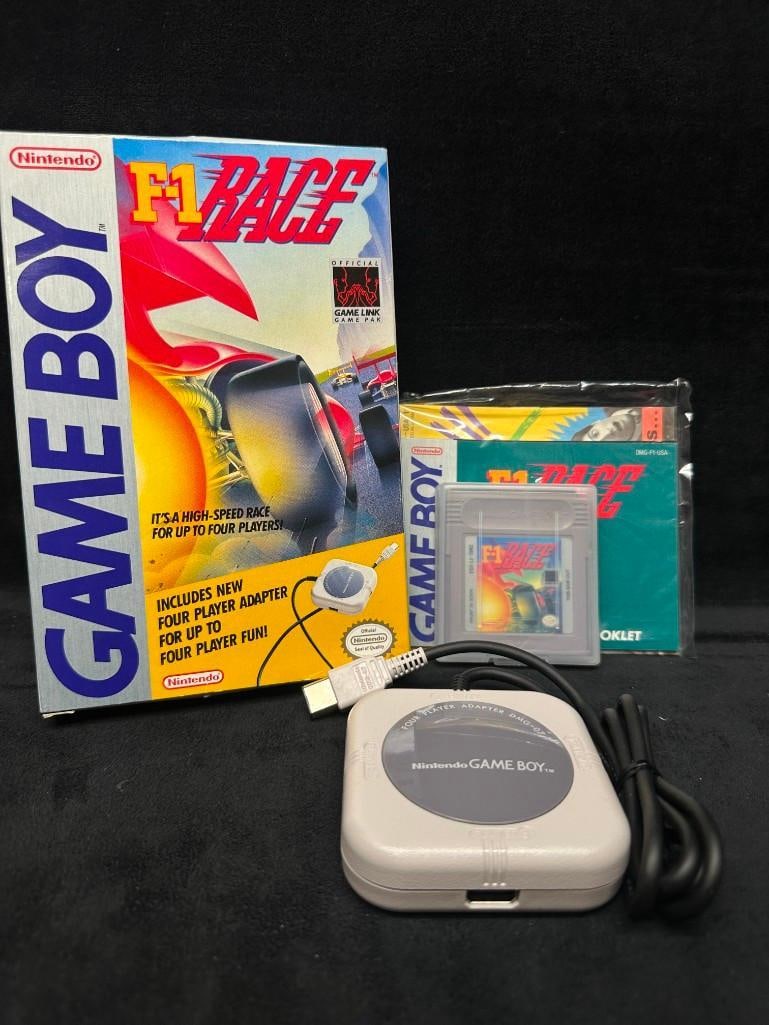 Nintendo Game Boy F1 Race Box Set: Tested complete Nintendo F1 Race set for Game Boy, including the original 1990 cartridge by Nintendo, instruction manual, retail box, and rare Four Player Adapter (model DMG-07). Features high-speed