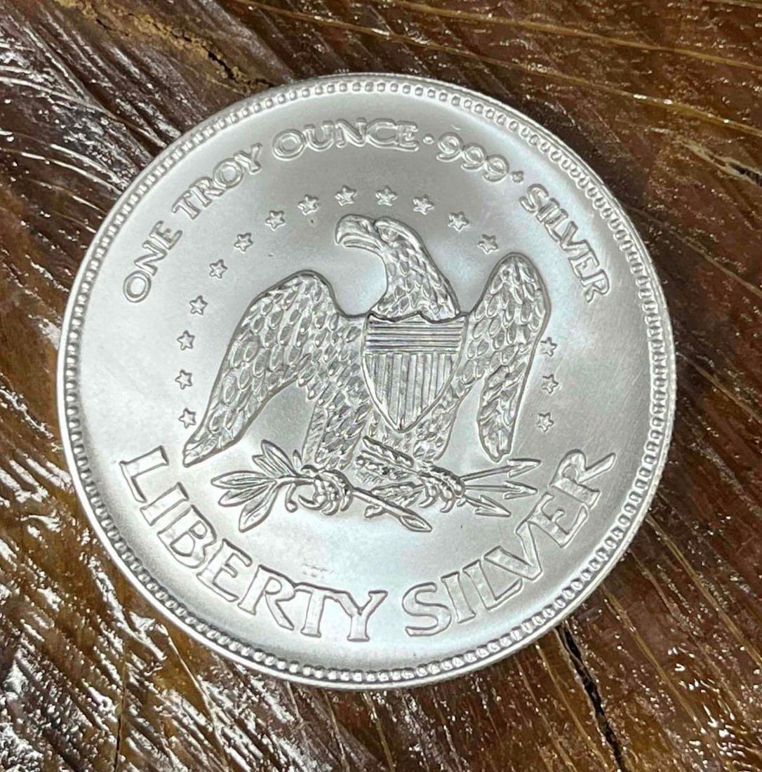 .999 Fine Silver A-Mark Liberty 1oz Bullion Round (Q): This Round has been tested and researched to the best of our ability prior to listing. Please view photos, as they are a part of the condition. DETAILS: Metal - .999 Fine Silver Tested - Yes Size - 38