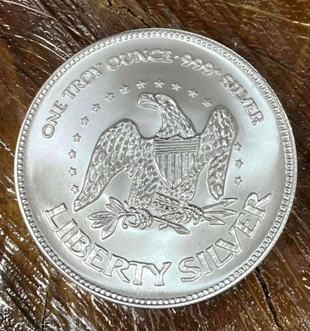 .999 Fine Silver A-Mark Liberty 1oz Bullion Round (O): This Round has been tested and researched to the best of our ability prior to listing. Please view photos, as they are a part of the condition. DETAILS: Metal - .999 Fine Silver Tested - Yes Size -
