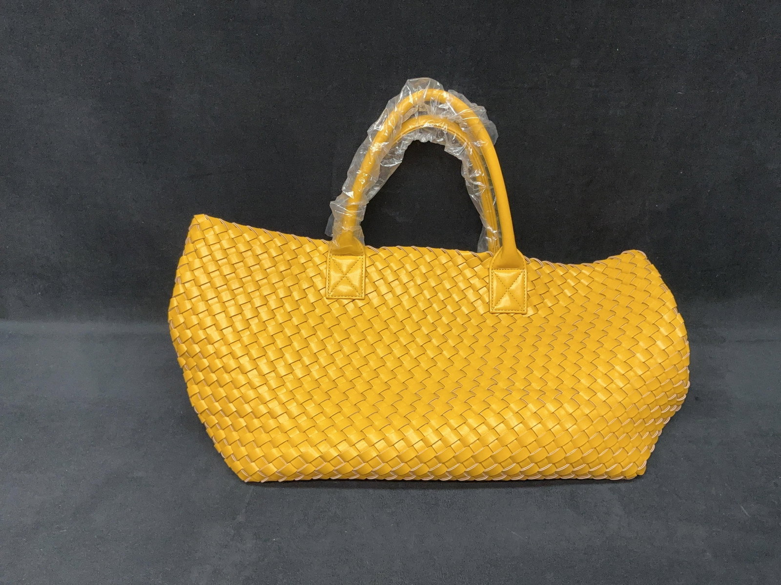 Yellow Faux Leather Woven Tote Bag: Yellow Faux Leather Woven Tote Bag Approximate Size: 20.5 inches wide height 16 inches depth 9 1/2 inches Approximate Weight: 2 pounds