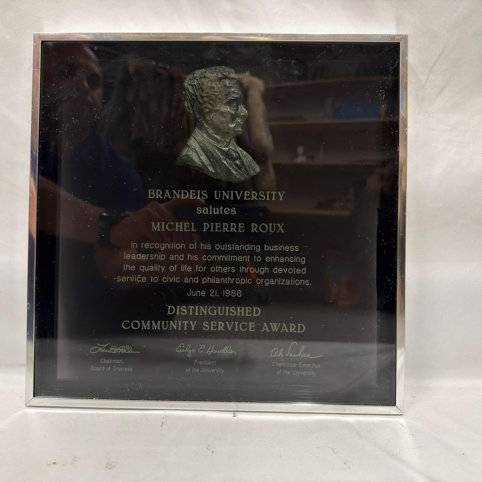 Brandeis University Michel Pierre Roux Distinguished Community Service Award: Framed Brandeis University Distinguished Community Service Award presented to Michel Pierre Roux on June 21, 1988. The plaque recognizes Roux for outstanding business leadership and his commitment to