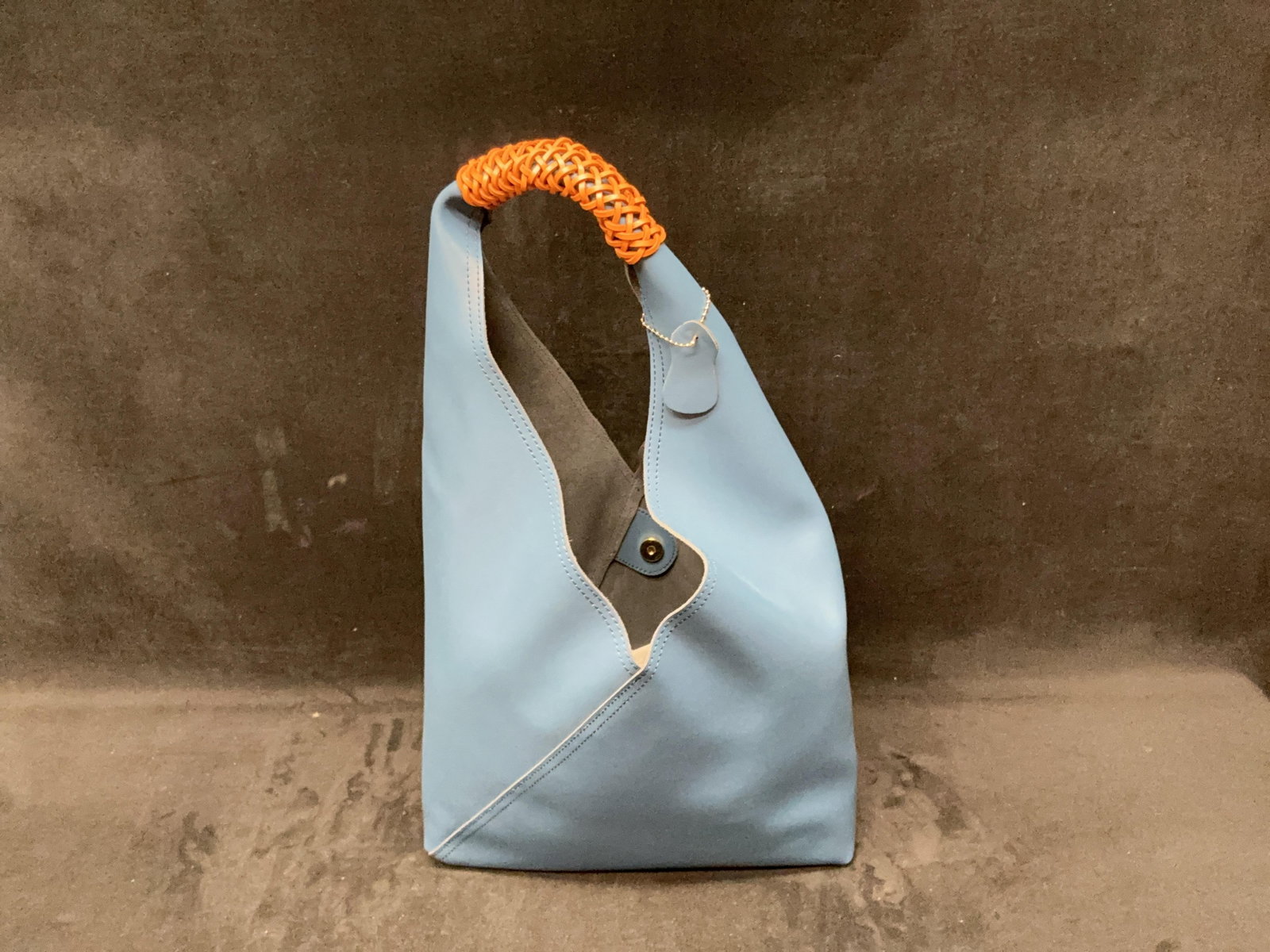 Blue Two-Tone Shoulder Tote With Wallet: Blue and brown two-tone leather-style tote bag with wrapped handle and included wallet. Appears unused. Please see photos for best description of condition. Approximate Weight: 1 pound 11.4 ounces.