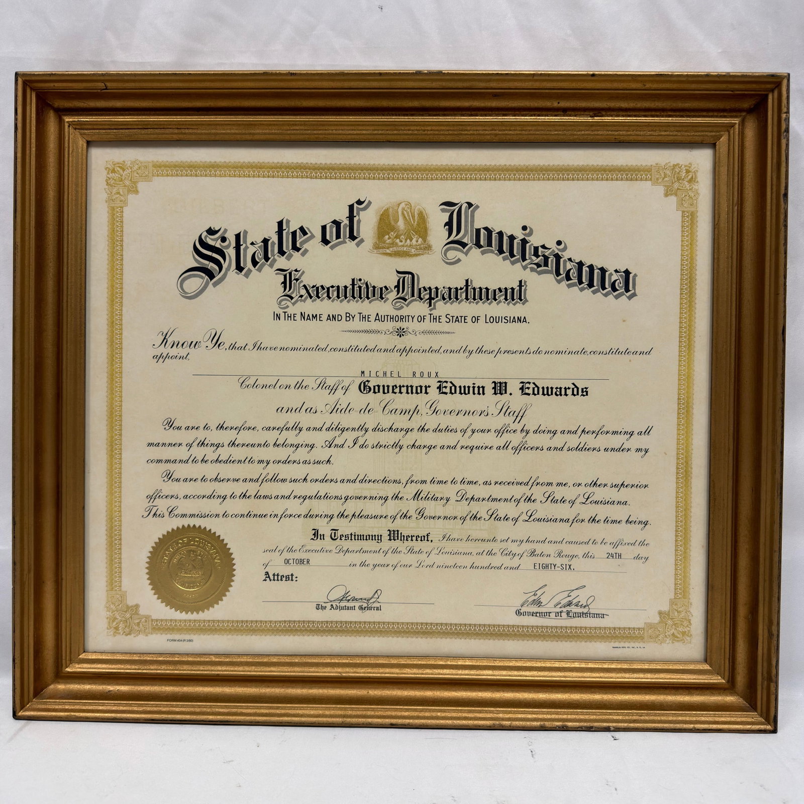 Michel Roux Louisiana Governor Edwin Edwards Honorary Colonel Commission: Framed State of Louisiana Executive Department commission appointing Michel Roux as Colonel on the Staff of Governor Edwin W. Edwards and Aide-de-Camp, Governor’s Staff. Issued in Baton Rouge on