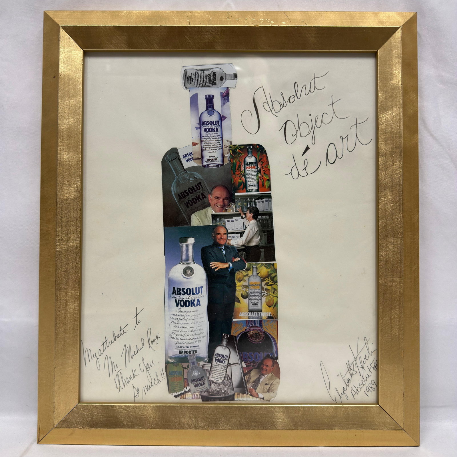 Michel Roux Absolut Vodka Absolut Object d’Art Signed Framed Collage 1989: Framed Absolut Vodka advertising collage associated with Michel Roux, featuring assorted vintage Absolut advertisements and images of Roux arranged in the form of a bottle. Inscribed “Absolut Ob