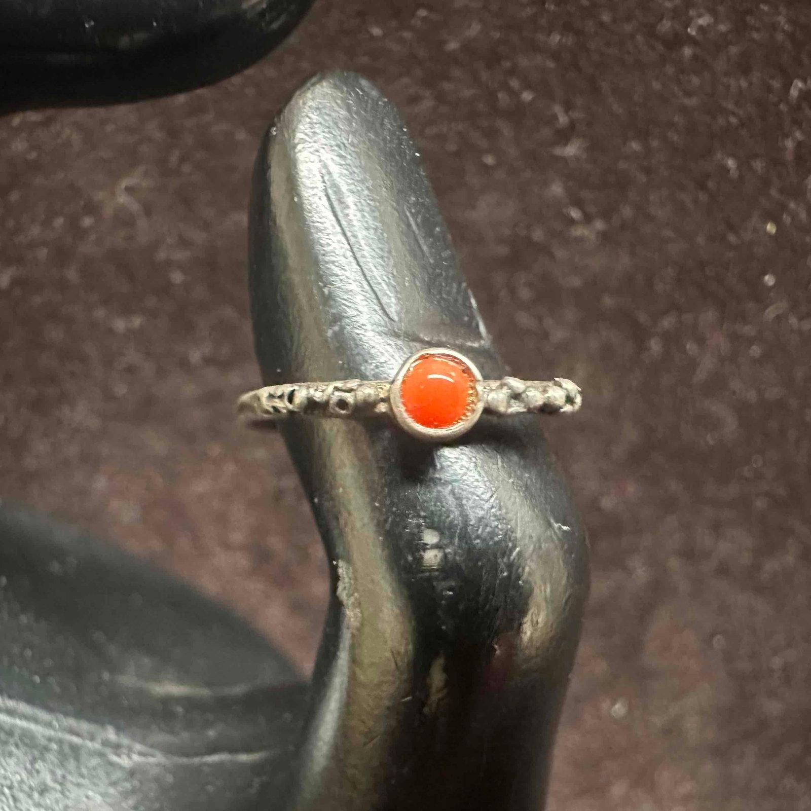 Sterling Silver Thin Band Red Coral Ring: This item is in good pre-owned, previously used/displayed condition with noticeable light wear, and surface scratches. Please reference all photos for full details. This piece of jewelry has been test