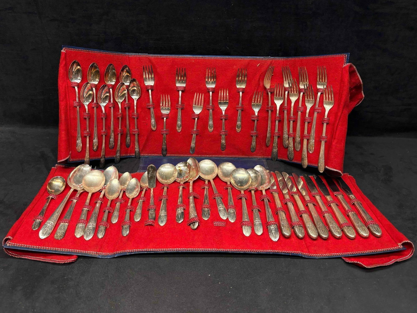 Wm Rogers Mfg Co Silverplated Flatware Set with Extra Plate: This lot includes the reputable vintage American flatware brand, Wm. Rogers Mfg. Go. Commonly produced during the 19th and mind-20th century, this lot includes 51 pieces that often sell at $5-$40 a