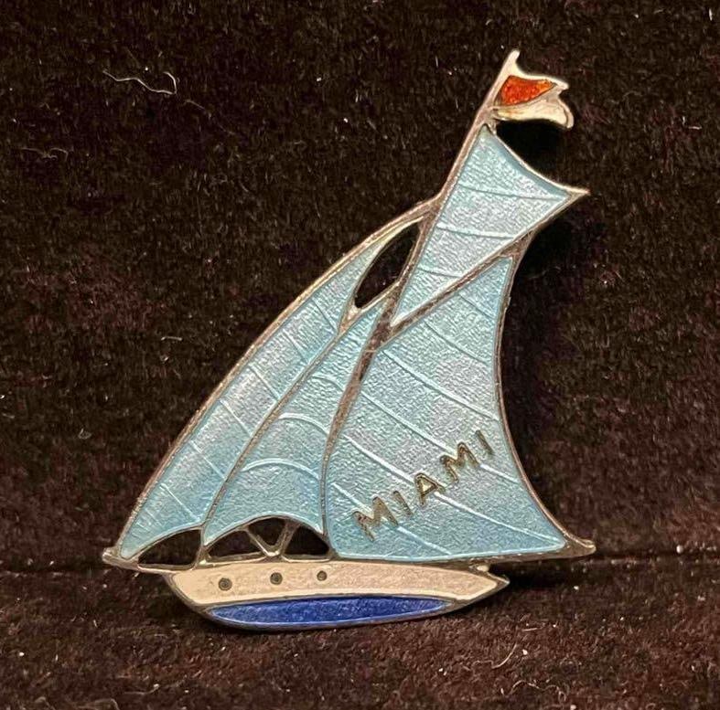 Vintage Blue Guilloche Enamel Sail Boat Miami Brooch: This lot contains a Vintage Blue Guilloche Enamel Sail Boat Miami Brooch. It is approx 1 1/2" x 1 1/4" x 1/4". Total weight is approx 0.1oz. Overall the brooch is in good pre owned condition