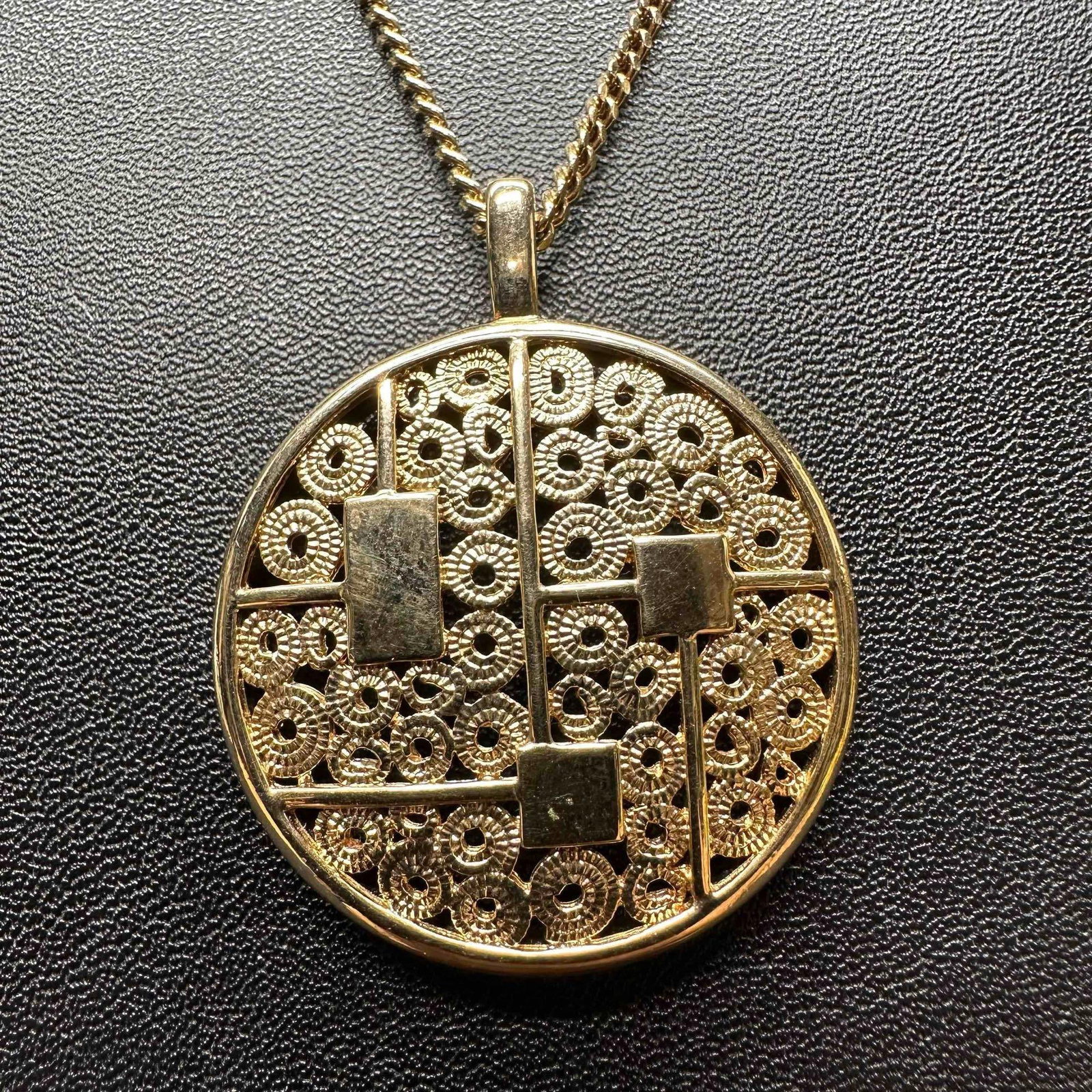 Sarah Coventry Geometric Pendant Gold Tone Art Deco Style Necklace: Signed Sarah on the back of the pendant. This item is in good pre-owned, previously displayed condition with light wear, and surface scratches. Please reference all photos for full details. Necklace: 