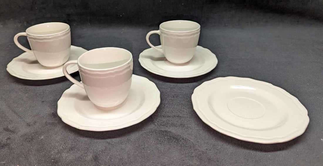 Gibson Designs Miranda China 3 Cups & 4 Saucers: Gibson Designs Miranda China 3 Cups & 4 Saucers. The saucers are approx 6 1/4" x 1 1/2" x 6 1/4" and the total weight is 1.49lb. Each cup is approx 4 1/4" x 3" x 3" and the total weight is 1.08lb