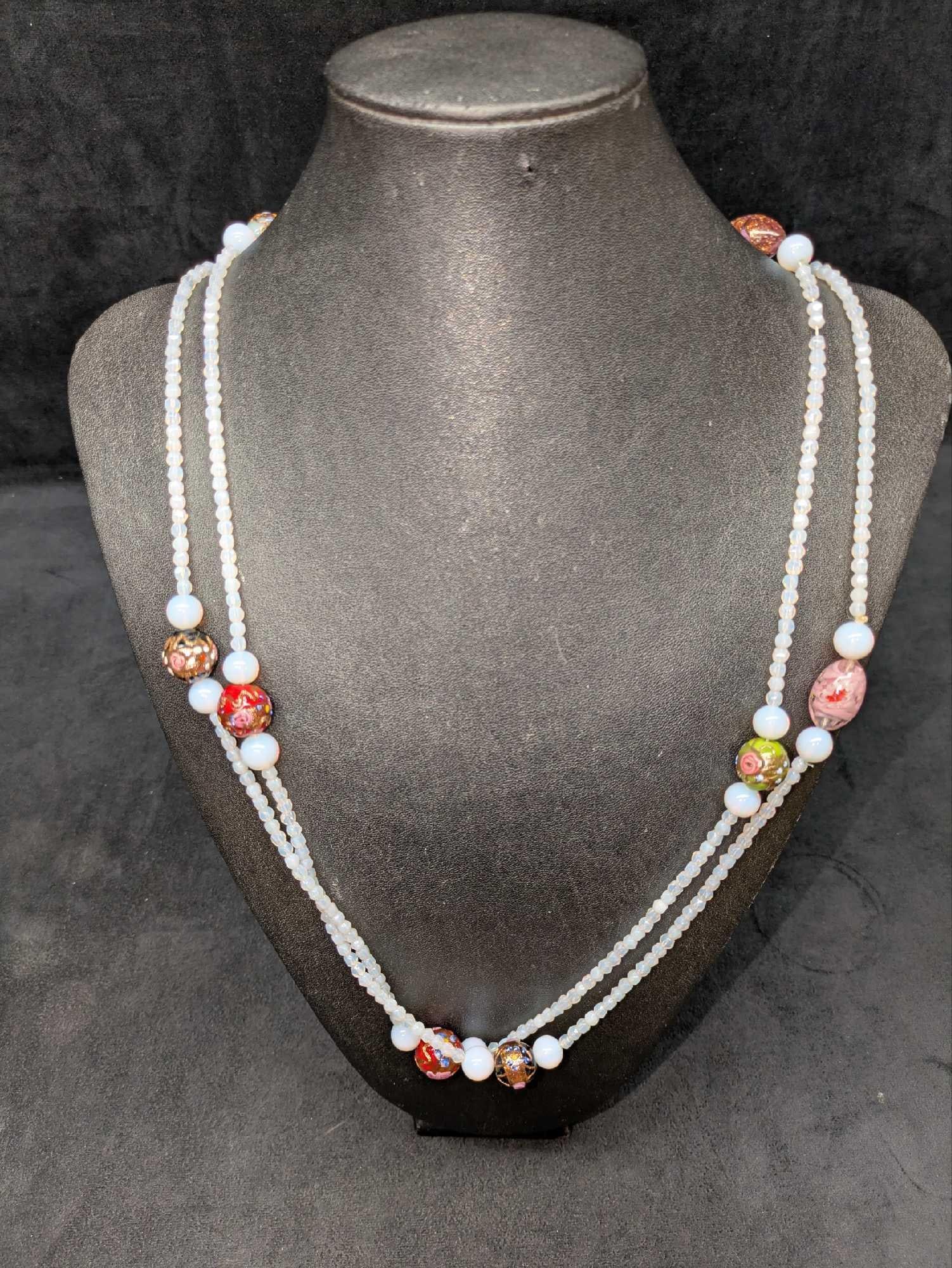 Vintage Italian Murano Double Strand Art Glass Bead Necklace NNNN: Vintage Italian Murano Double Strand Art Glass Bead Necklace NNNN. Glass beads with hand painted designs along with other beads of different sizes. Is approx 60" and it weighs 0.17b.