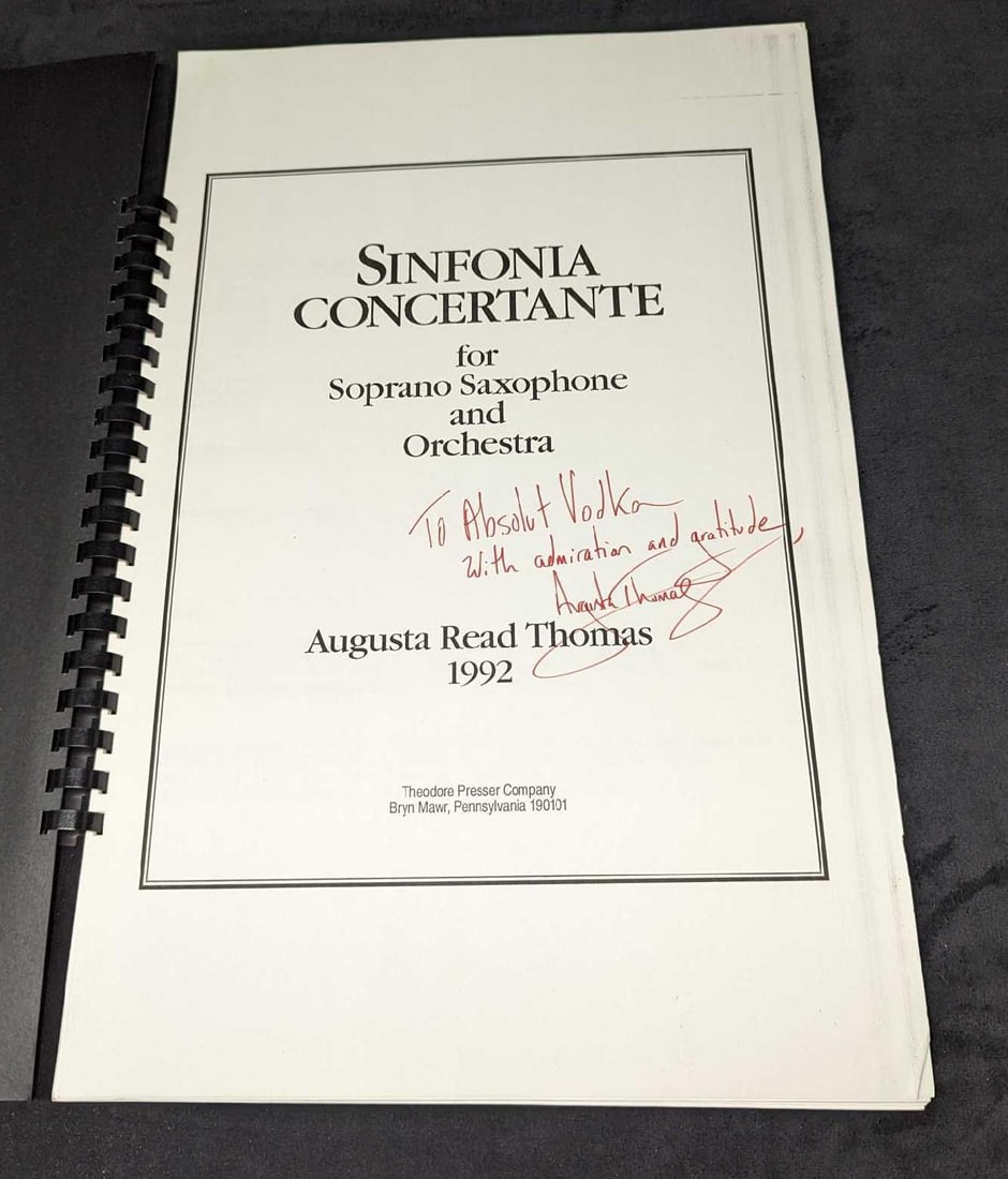 Autographed Augusta Read Thomas Sinfonia Concertante Sheet Music: Autographed Augusta Read Thomas Sinfonia Concertante Sheet Music. Was made out for "Absolut Vodka". This is approx 11 1/2" x 1" x 17" and it weighs 1.40lb. There is some shelf