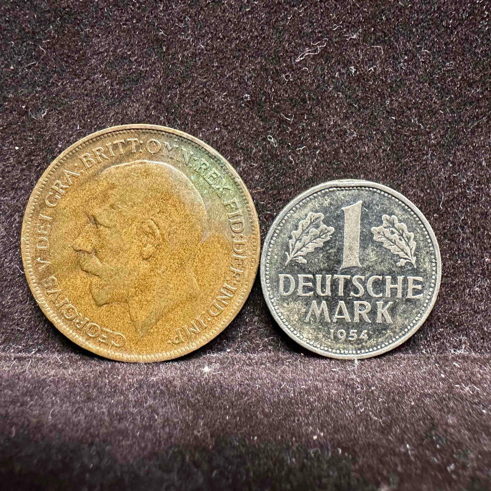 Historic European Coins British Penny and German Deutsche Mark Set: This set includes two historical European coins a British Penny Coin and a 1954 German 1 Deutsche Mark coin. These items are in good pre-owned, previously displayed condition with light wear, and