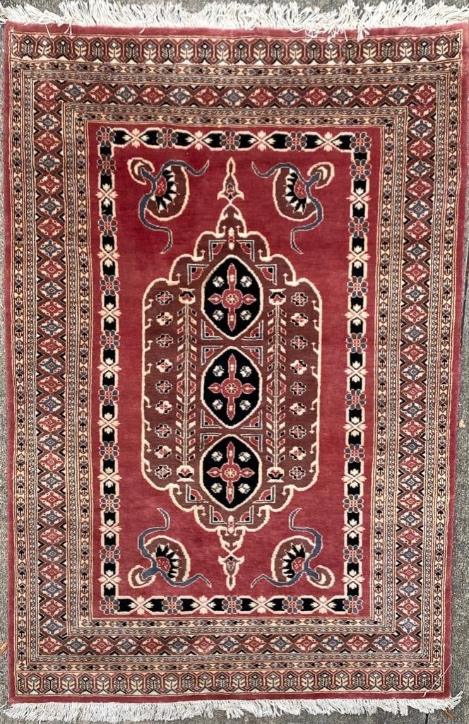 Soft Wool Rug, Possibly Turkish: Soft Wool Rug, Possibly Turkish Wool rug with very soft pile. There are some stains on the fringe, but the rug itself is in good condition and has been cleaned recently. There is no tag on the rug, bu