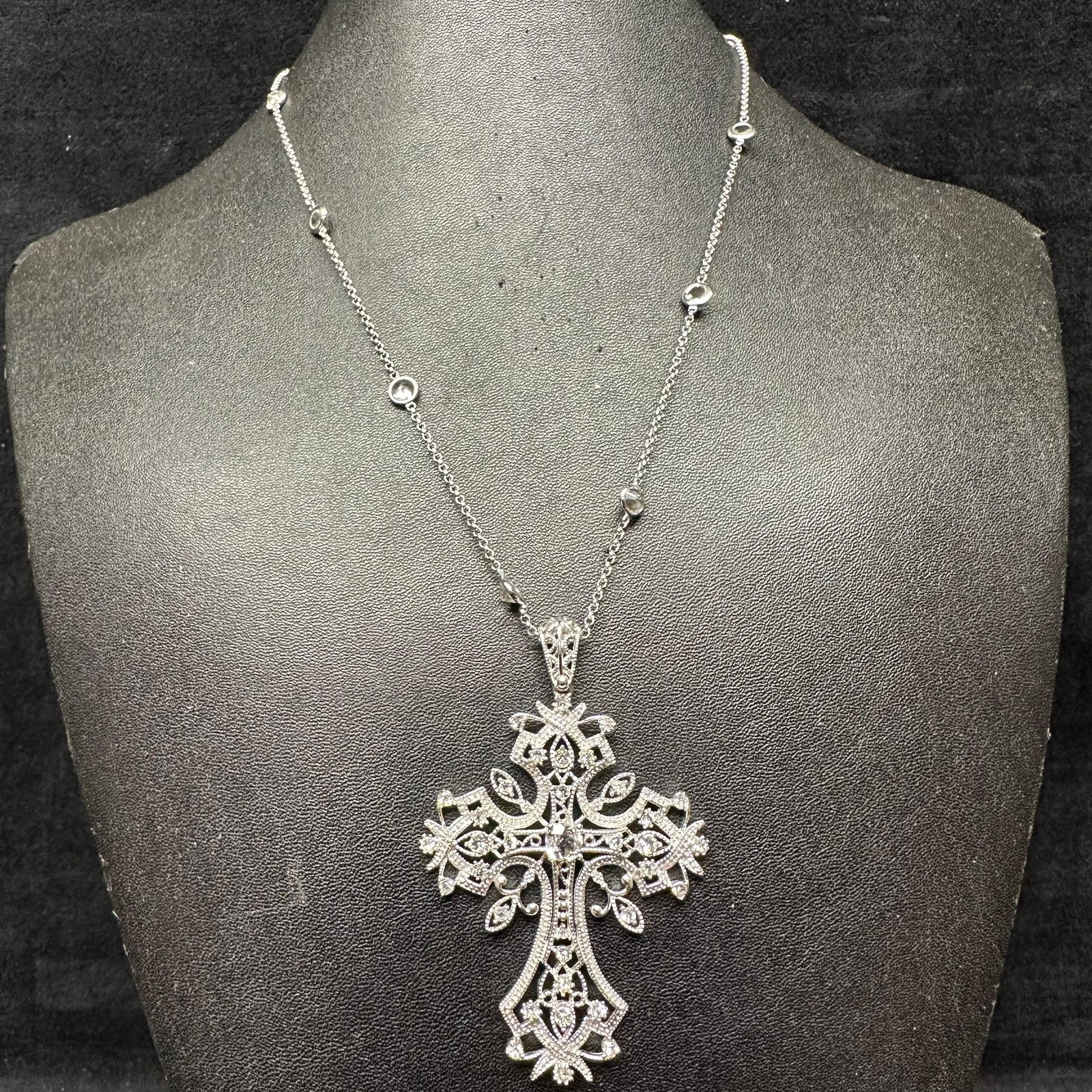 White Sapphire Center CZ Encrusted Accent Sterling Silver Cross Necklace: This item is in good pre-owned, previously used/displayed condition with noticeable light wear and surface scratches. Please reference all photos for full details. This piece of jewelry has been