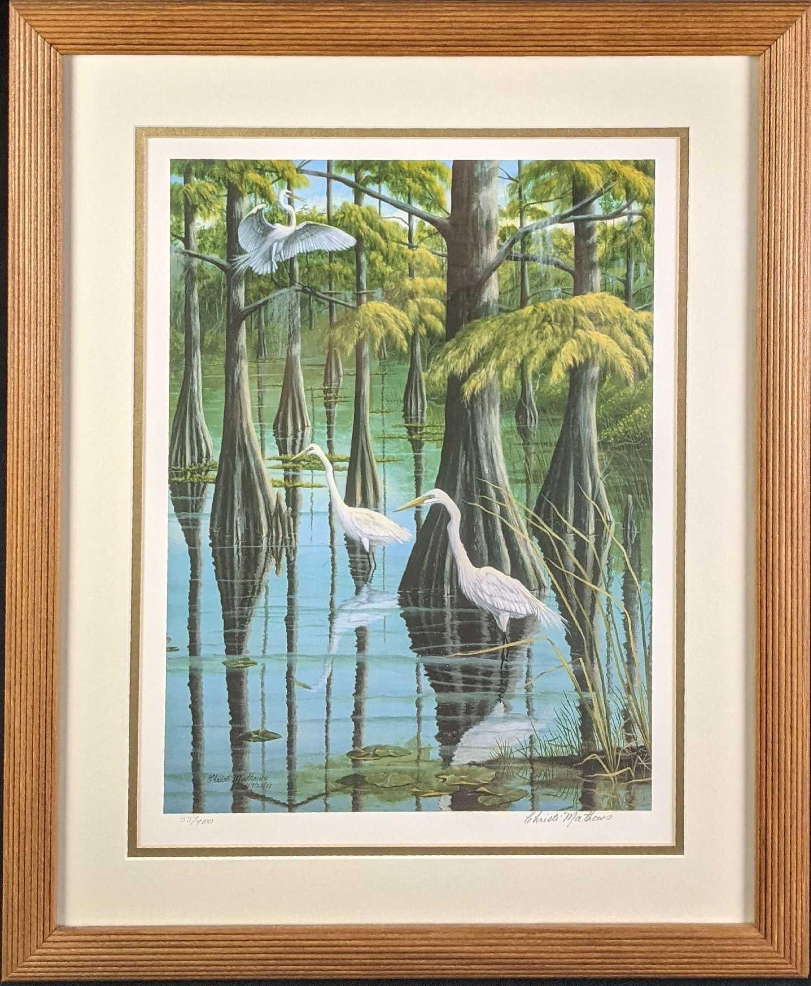 Framed Christi Mathews Signed LE Two Egrets: Here is a limited edition print by artist Christi Mathews of two egrets. This print is #55 out of #900. The framed print is approx 18" x 1 1/2" x 22" and weighs 4.5lbs. The fram