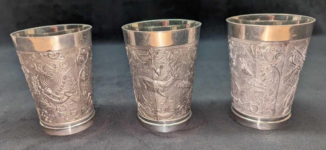 3 Vintage German Zinn Becker Pewter Cups: 3 Vintage German Zinn Becker Pewter Cups. Each cup is approx 3" x 3" x 4 1/4" and together they weigh 1.64lb. The cups are in good, vintage condition with some light scratches and there are some marki