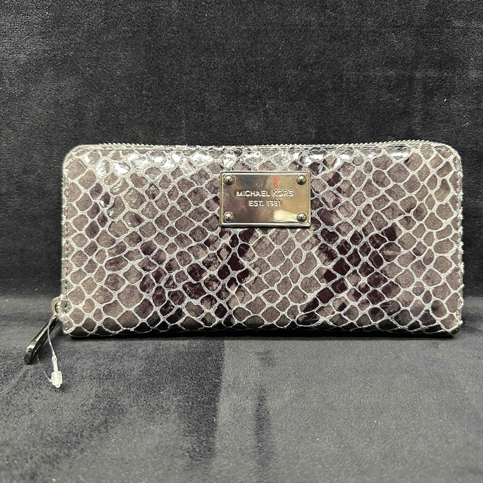 Michael Kors Black Gray Python Style Embossed Leather Clutch Wallet: This item is in good pre-owned, previously used condition with minor surface wear. Please reference all photos for full details. Wallet: 8 1/2" x 4" x 1". Weight: 0.5 lbs.