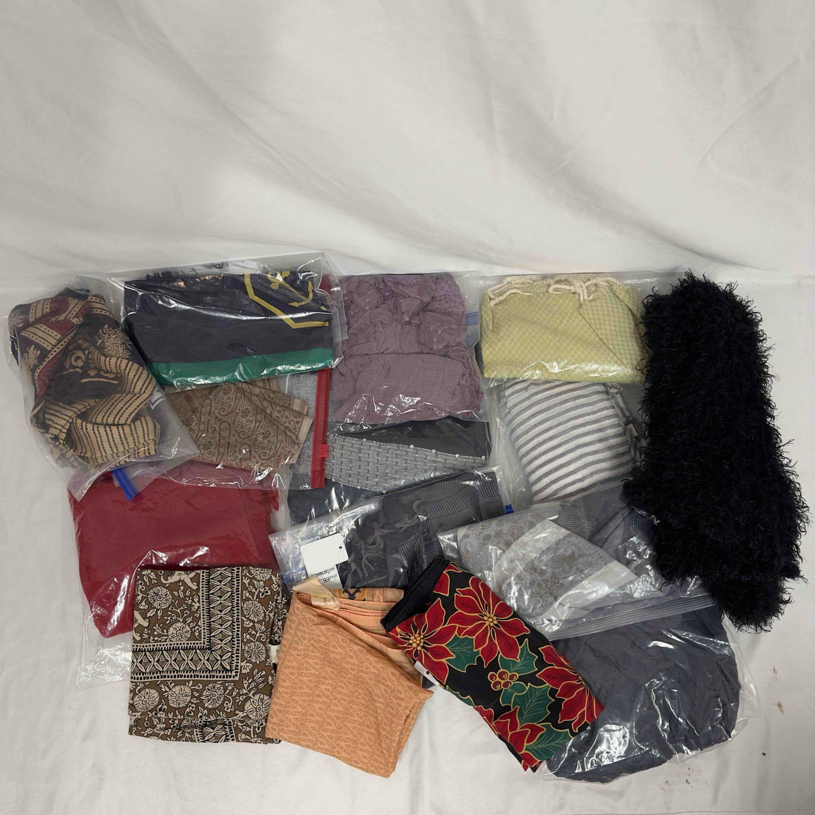 Scarf Fabric Clothing Material Collection Lot of 15 Fabrics Scarves Head Neck Wraps: Scarf Fabric Clothing Material Collection Lot of 15 Fabrics Scarves Head Neck Wraps. Various lot of scarves, neck and head wraps, and clothing materials. This collection of materials includes various 