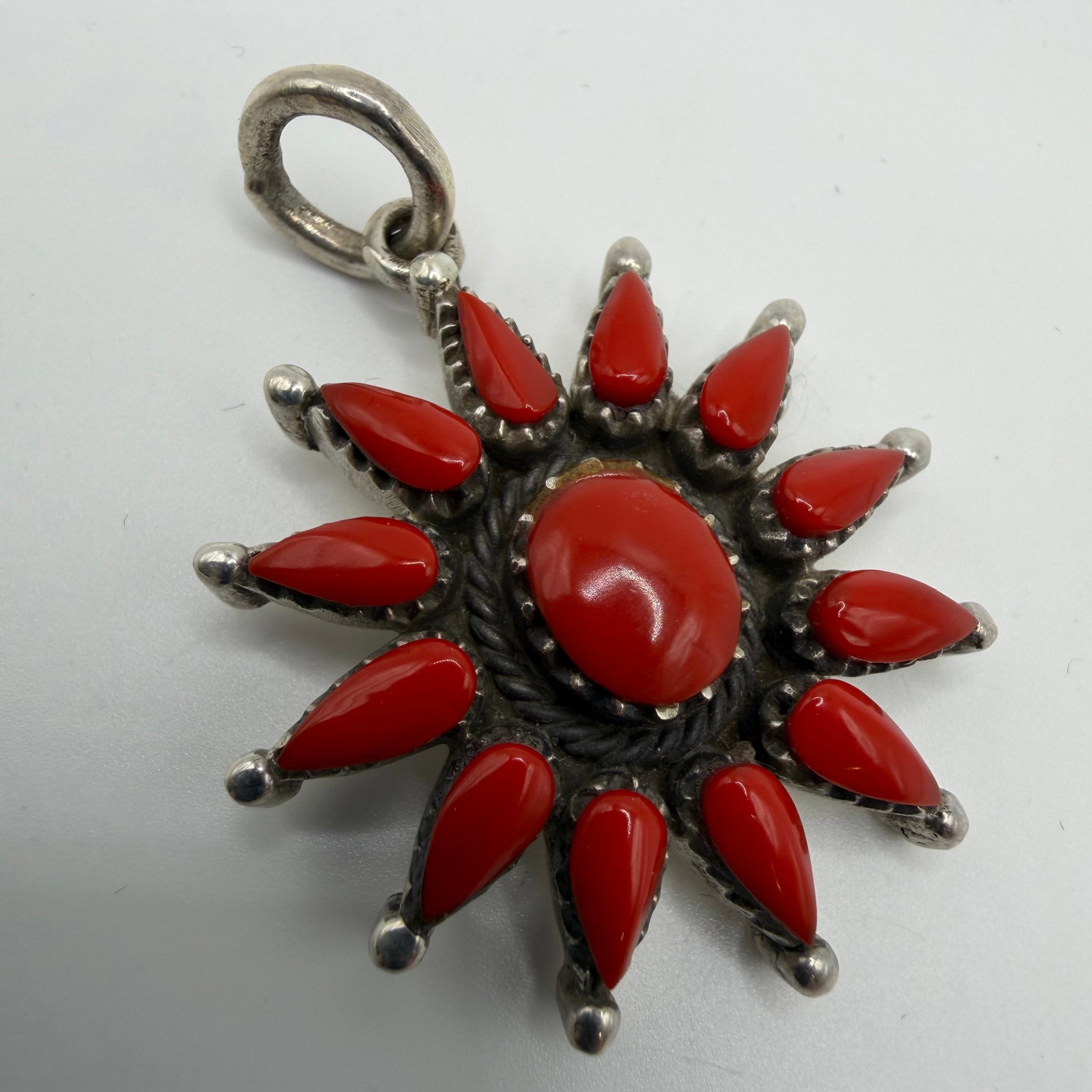 Zuni Navajo Style Red Coral Sterling Silver Pendant: This item is in pre-owned, previously used/displayed condition with noticeable light wear and surface scratches. Please reference all photos for full details. This piece of jewelry has been carefully 