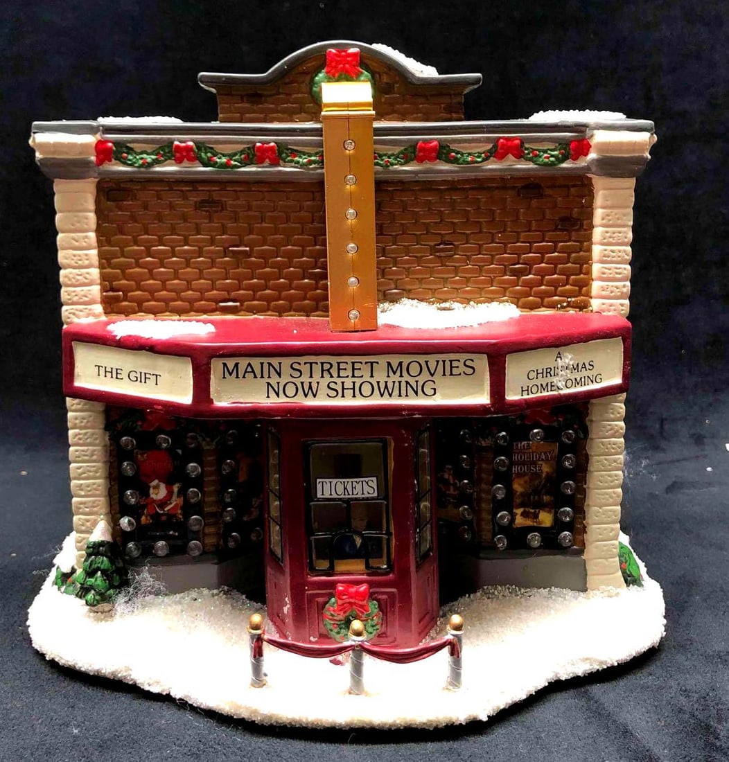 Main Street Movie Theater The Village Collection By St.Nicholas Square: This lot contains the Main Street Movie Theater The Village Collection by St.Nicholas Square. Perfect addition to any Christmas Winter/Holiday decor. The theater comes in its original box. The box is